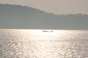 Fishermen in boat. Goa India